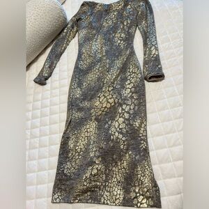 Dress the Population. Gold and black animal print. Classy and elegant.